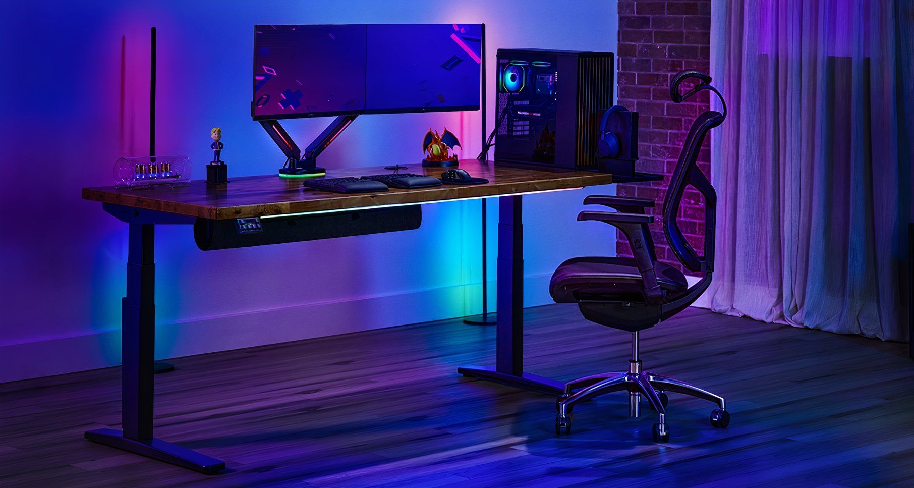 Uplift V3 standing desk — full view with accessories and dual monitor setup